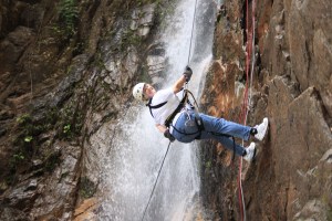 Me, coming down a wet, slippery cliff face